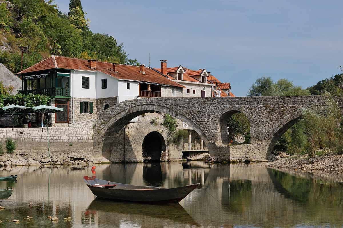 Rijeka Crnojevića - village in Montenegro, with Skadar lake and well known bridge - symbol of this village.